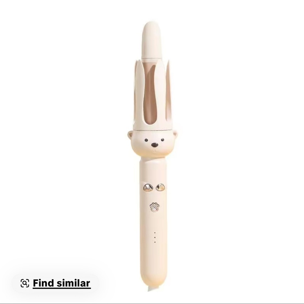 Rotating curling wand